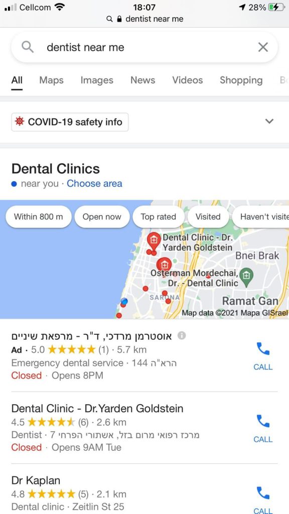 google search results on mobile for "dentist near me"