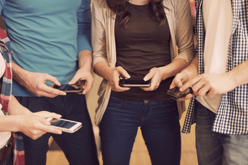 People engaging with brands on their mobile device